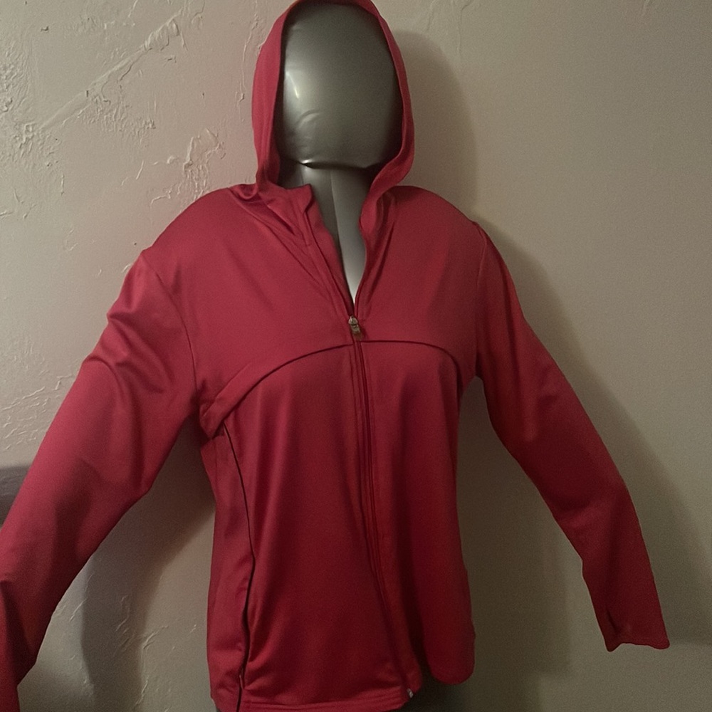 Pink sweater with pockets and thumb holes on sleeves